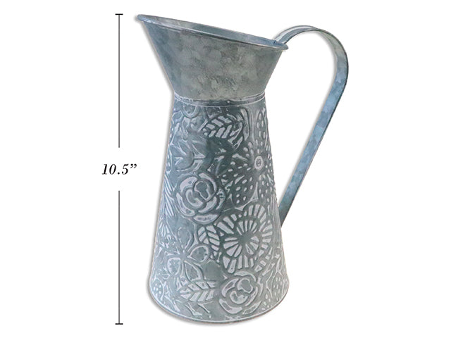 Carton of 12 10-3/8In White Washed Galvanized Embossed Flower Metal Water Pitcher.